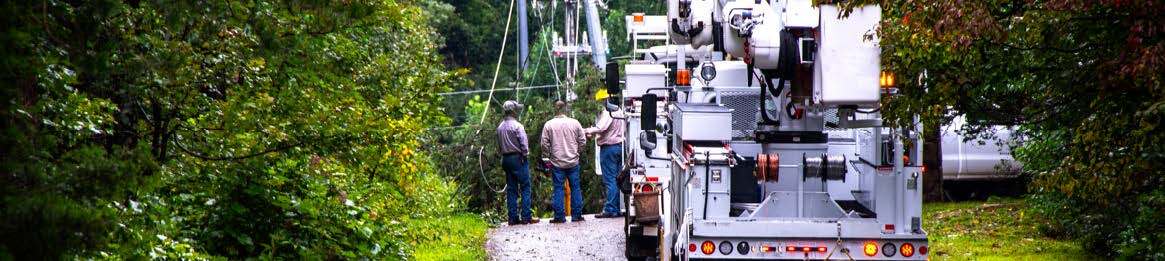 Electric Utilities workers and utility truck