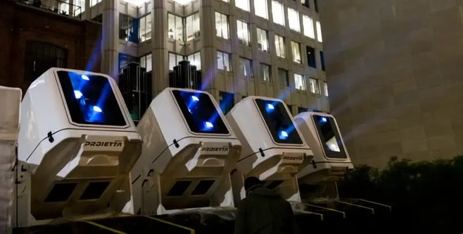 Panasonic projectors shine light on a building to create a projection mapping experience.