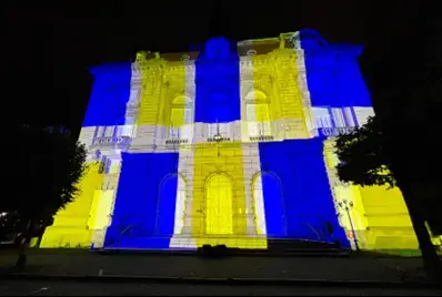 A building with a light on itDescription automatically generated