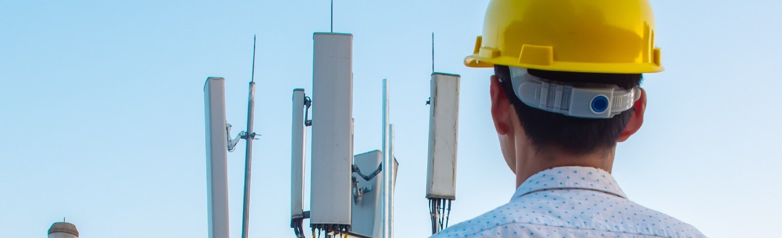 Engineer with the communications tower