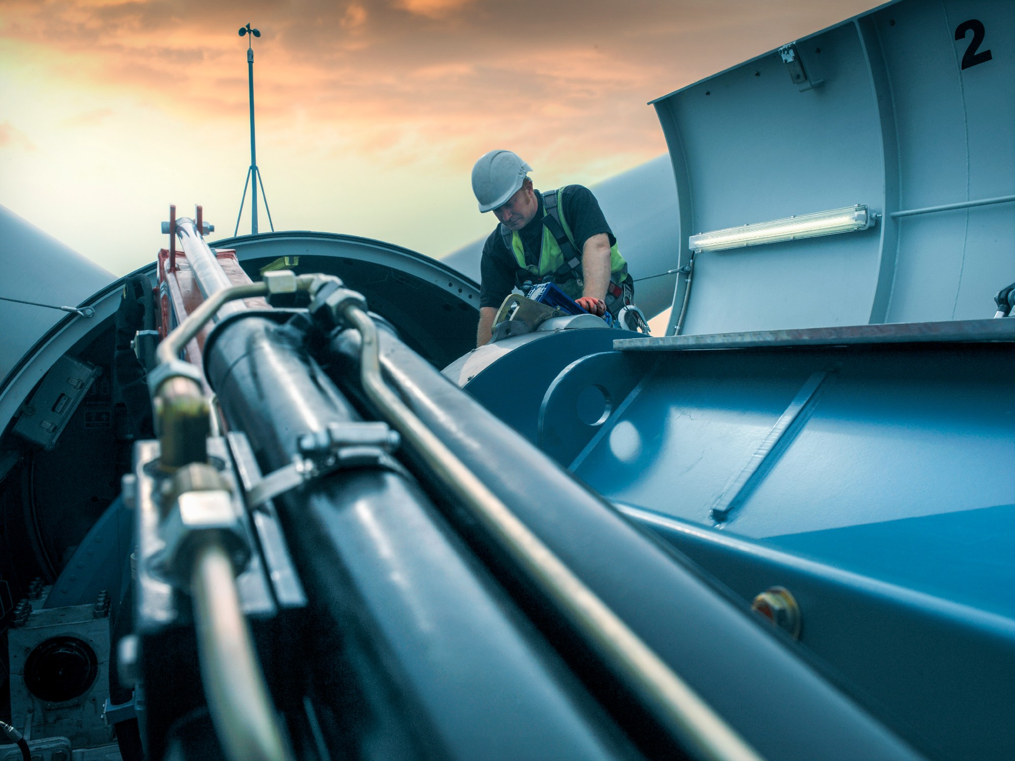 engineer_at_top_of_wind_turbine